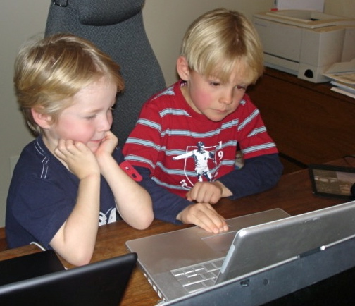 two boys on the computer